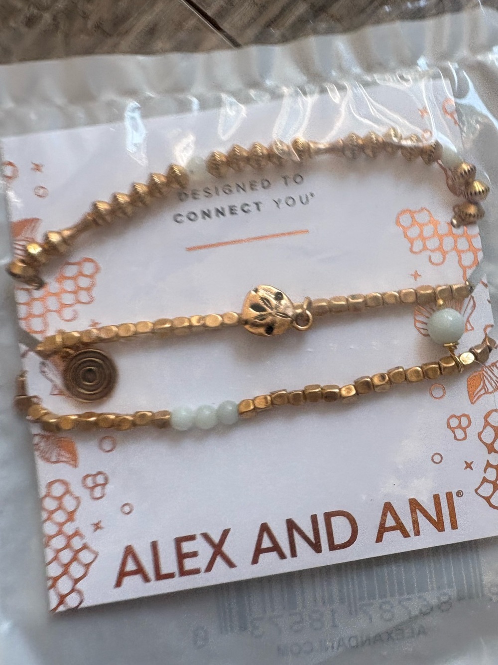 Alex and Ani Gold Tone Bracelet Sand-dollar Trio with White Accent Beads
